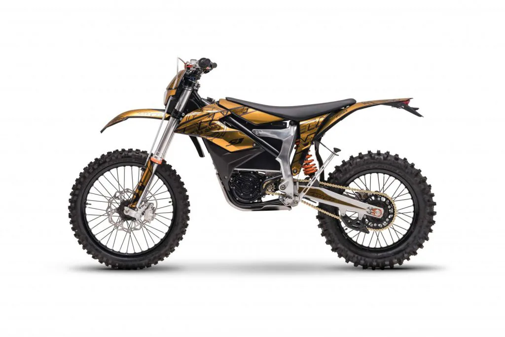Starland F29 electric dirt bike in gold and black – left side on white background