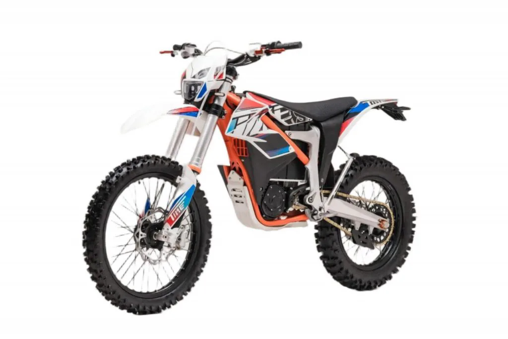 Starland F29 electric dirt bike in orange and white – left side on white background