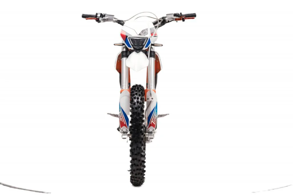 Starland F29 electric dirt bike in orange and white – front view on white background
