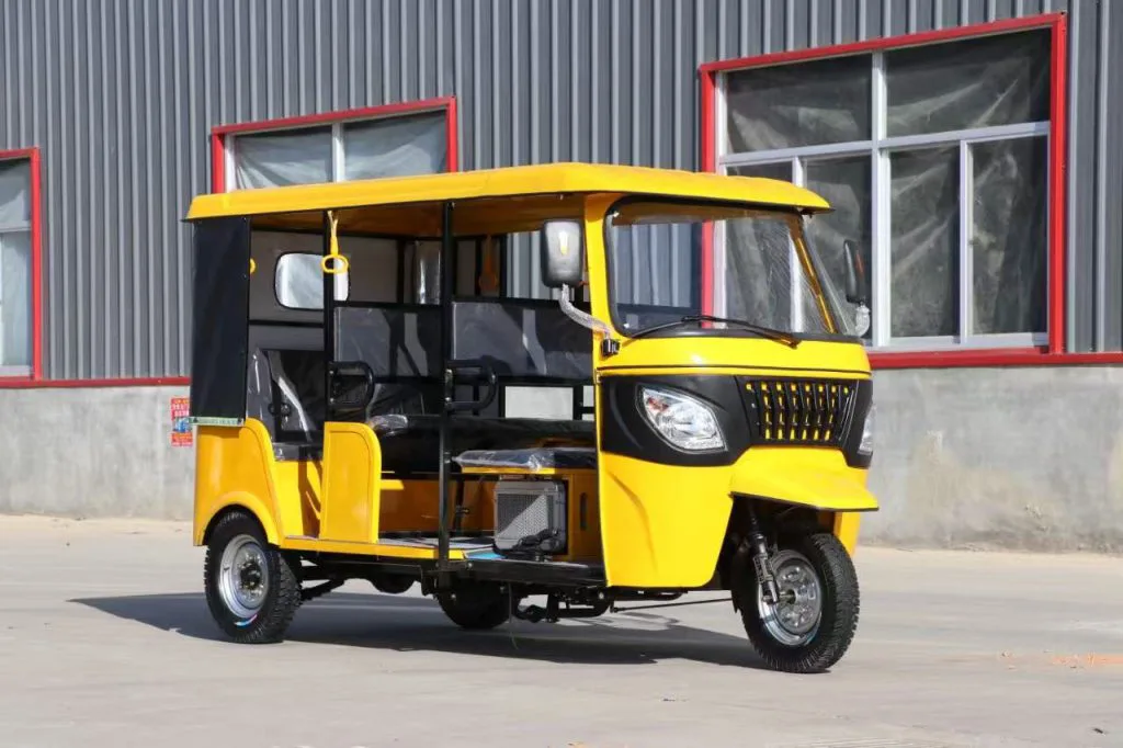 Three-row electric tuk tuk – front view at the factory