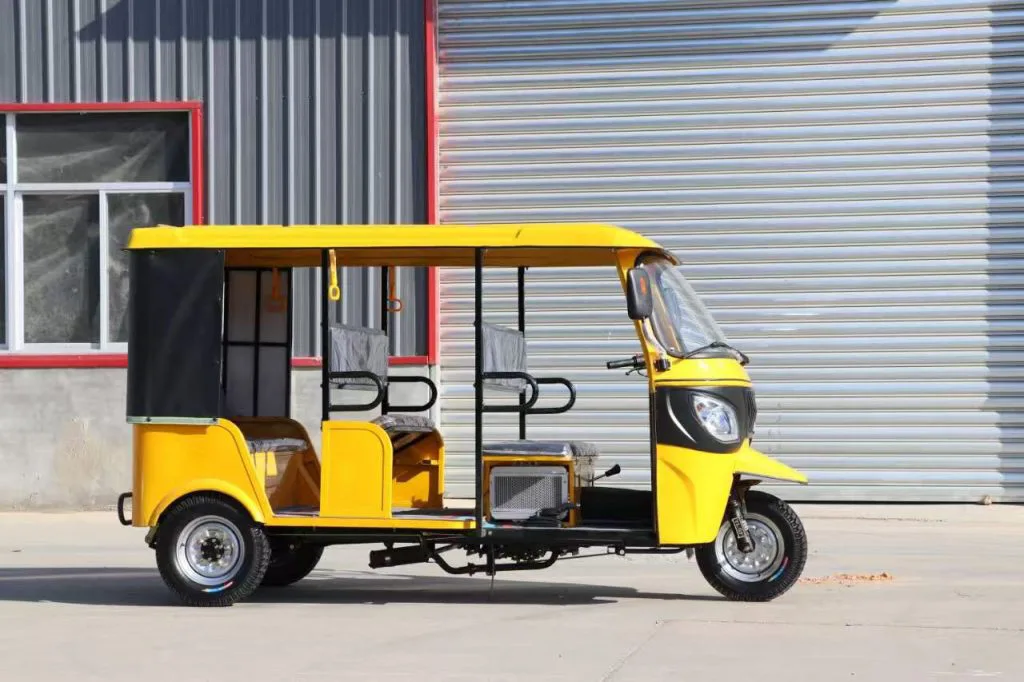 Three-row electric tuk tuk – rear three-quarter view