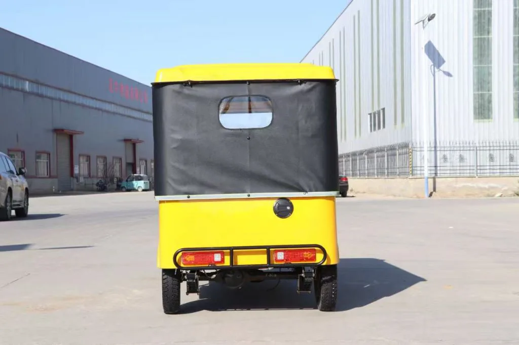 Three-row electric tuk tuk – side view of enclosed cabin