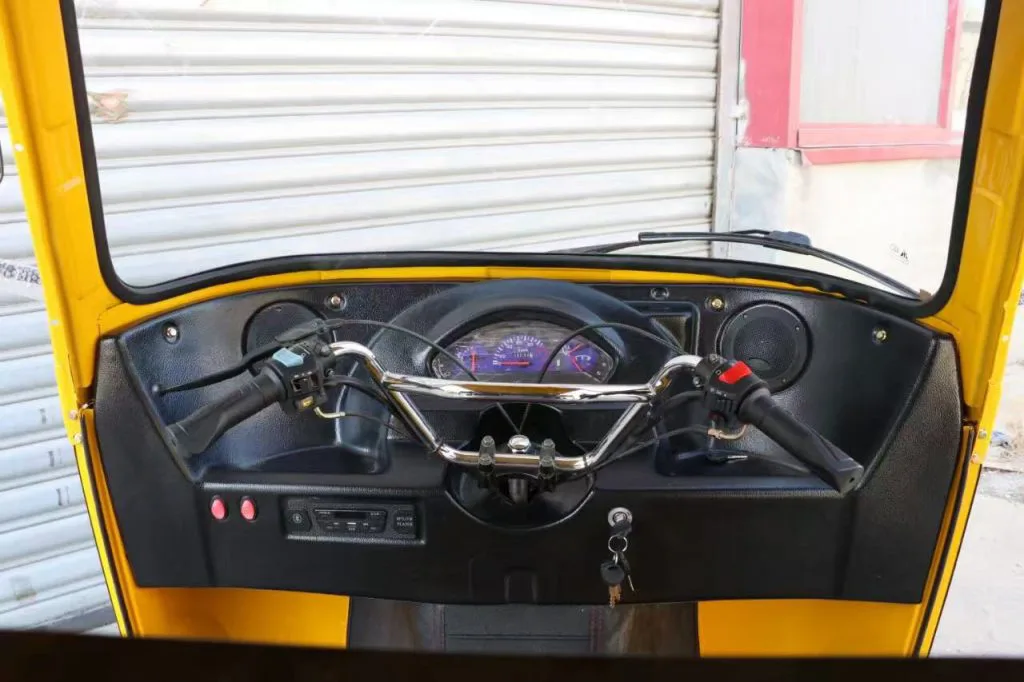 Three-row electric tuk tuk – driver dashboard and controls